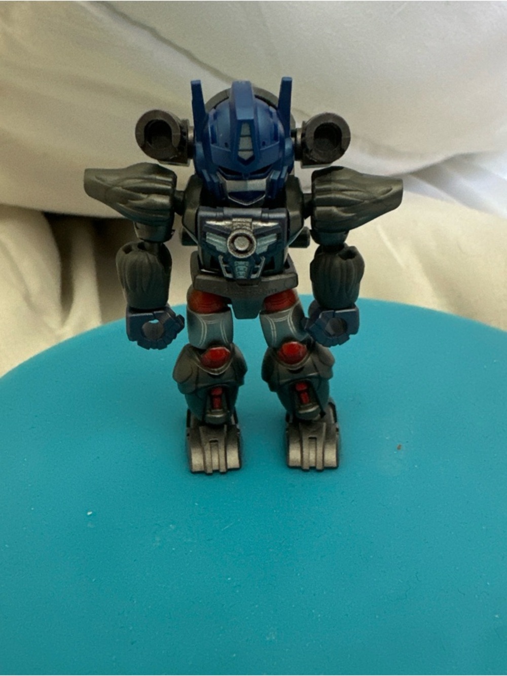 Hasbro Blue and Gray Robot Action Figure
